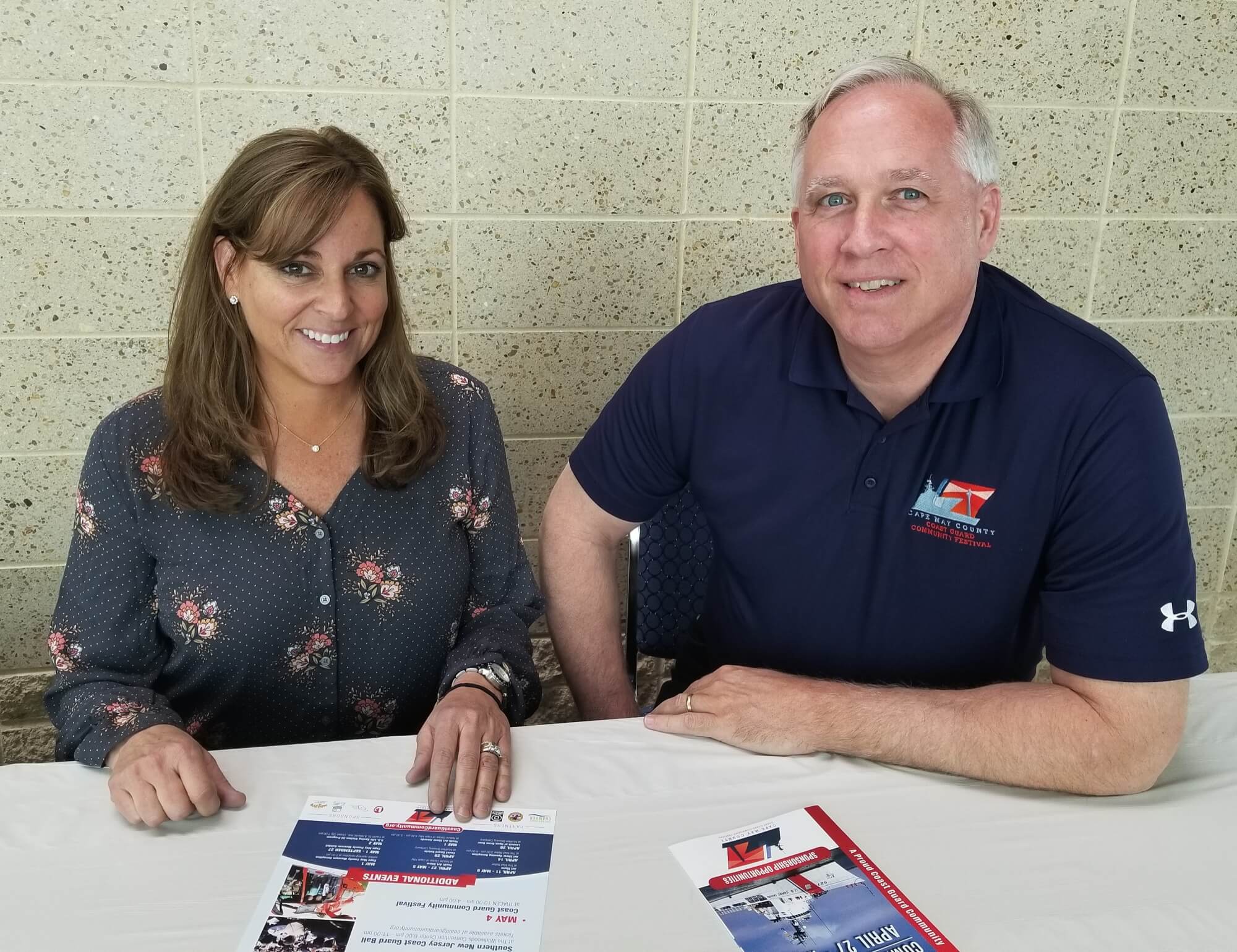 Coast Guard Community Foundation executive director Mike Couch (right) and  festival director Lee Anne Tarr (right)/.