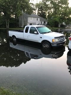 A car parked on Clearwater Drive June 3 after the water began to subside. 