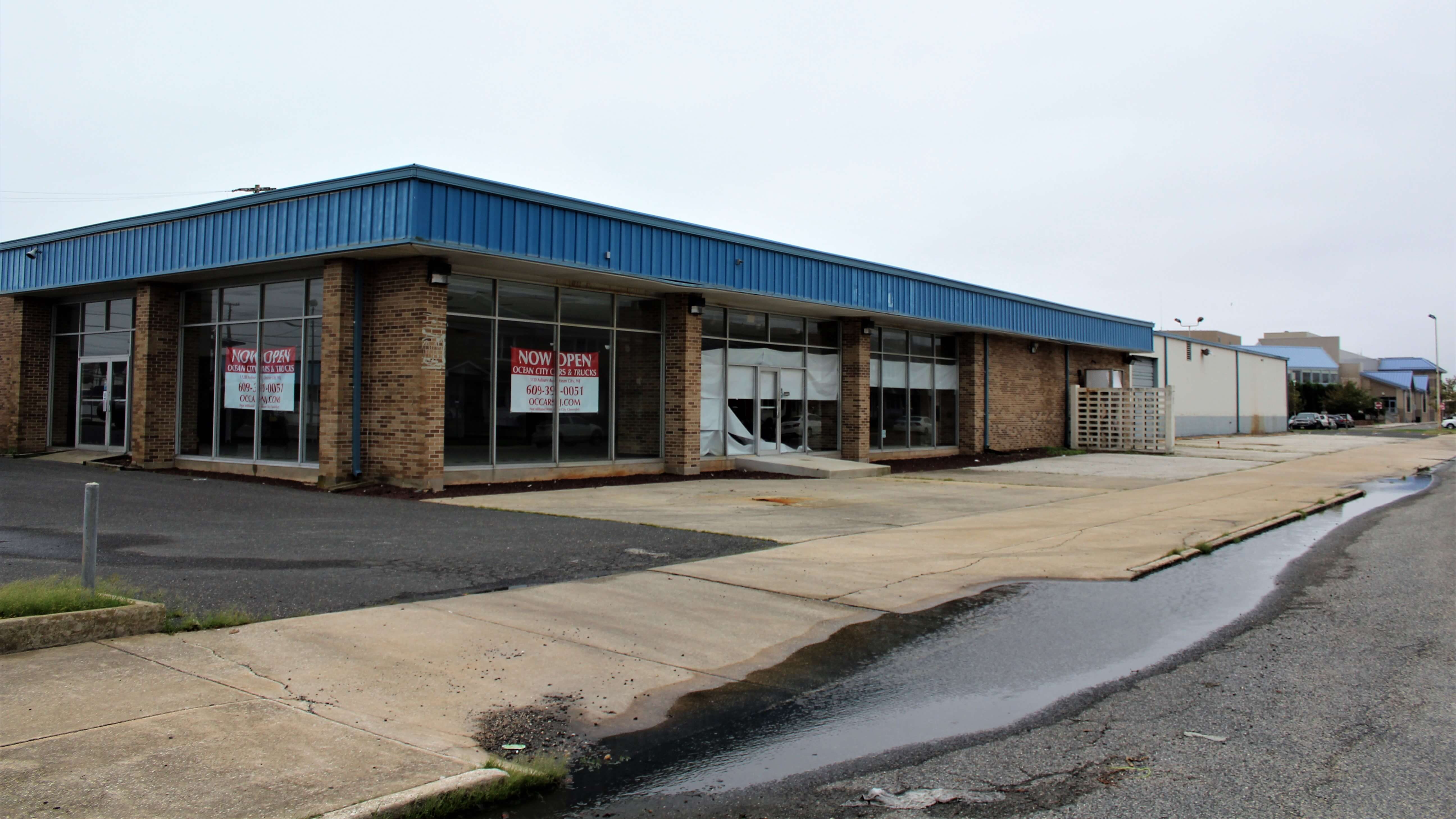 The former car dealership on Simpson Avenue has been vacant for years.  The owner has approval to build 21 single-family homes on the land. City Council has voted for the city to try to buy it or condemn it.