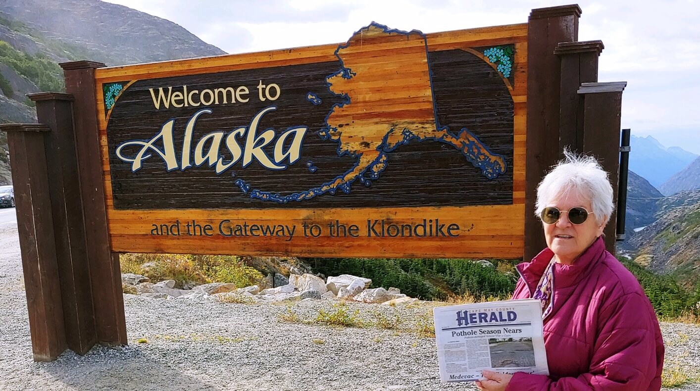 Carol Hines holds a recent Herald she carried to Skagway