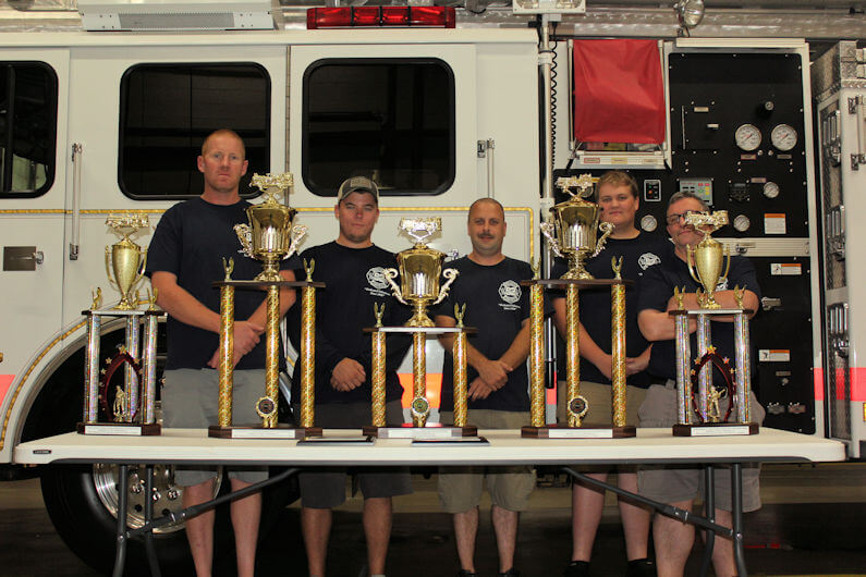 From left with the trophies won by Erma Volunteer Fire Company in the 2019 New Jersey State Firefighters' Convention in Wildwood: John Rogers