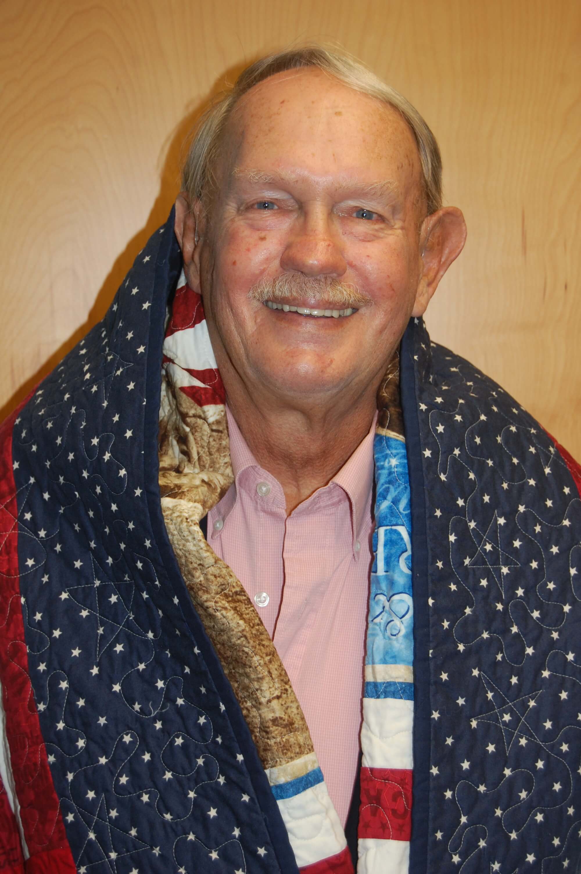 Ed Rhoad wears Quilt of Valor