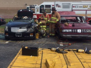 Rio Grande volunteer firefighters perform a rescue demonstration near the firehouse Oct. 5.