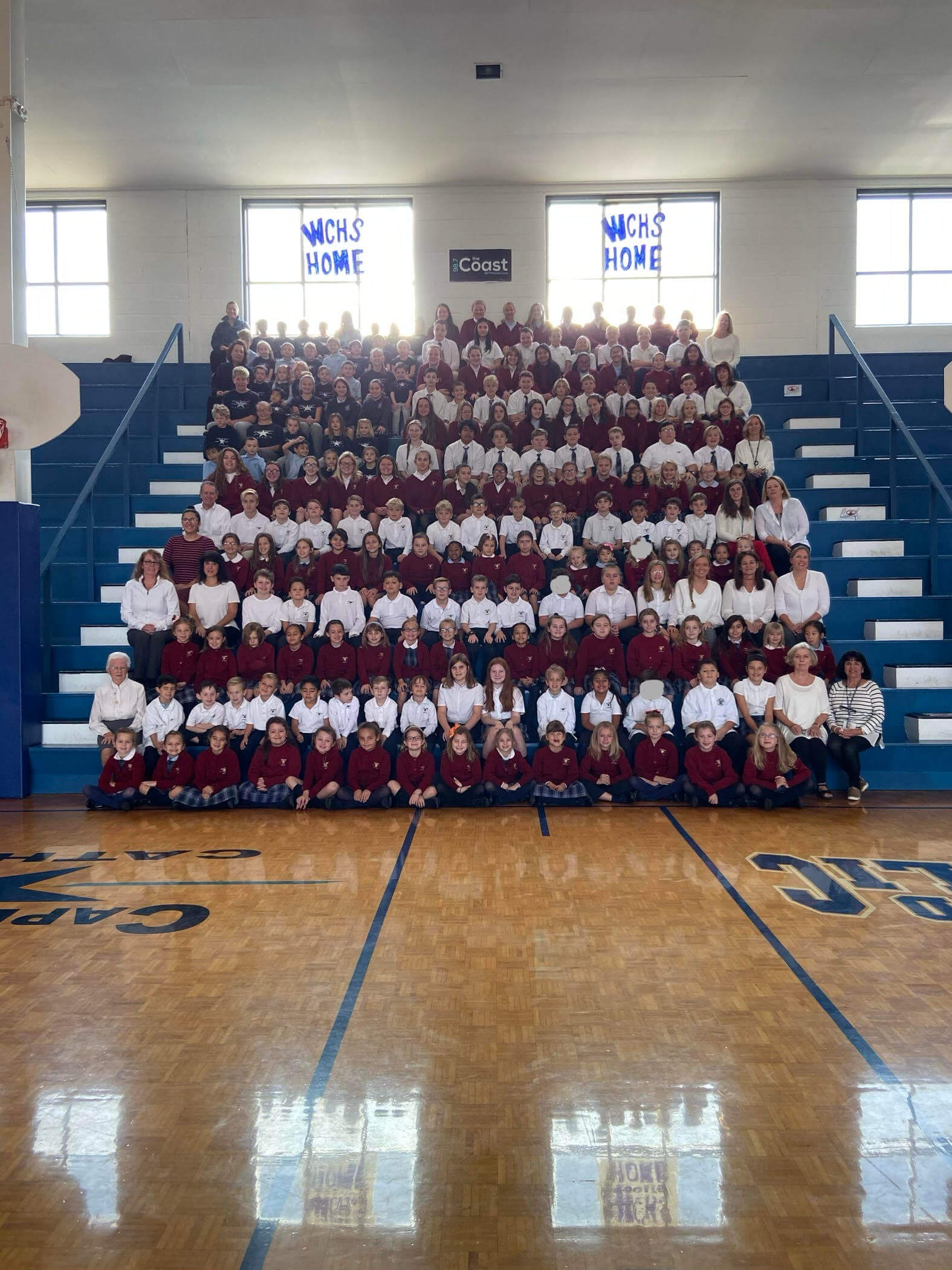 Pupils at Cape Trinity Catholic School form a living flag on Veterans Day