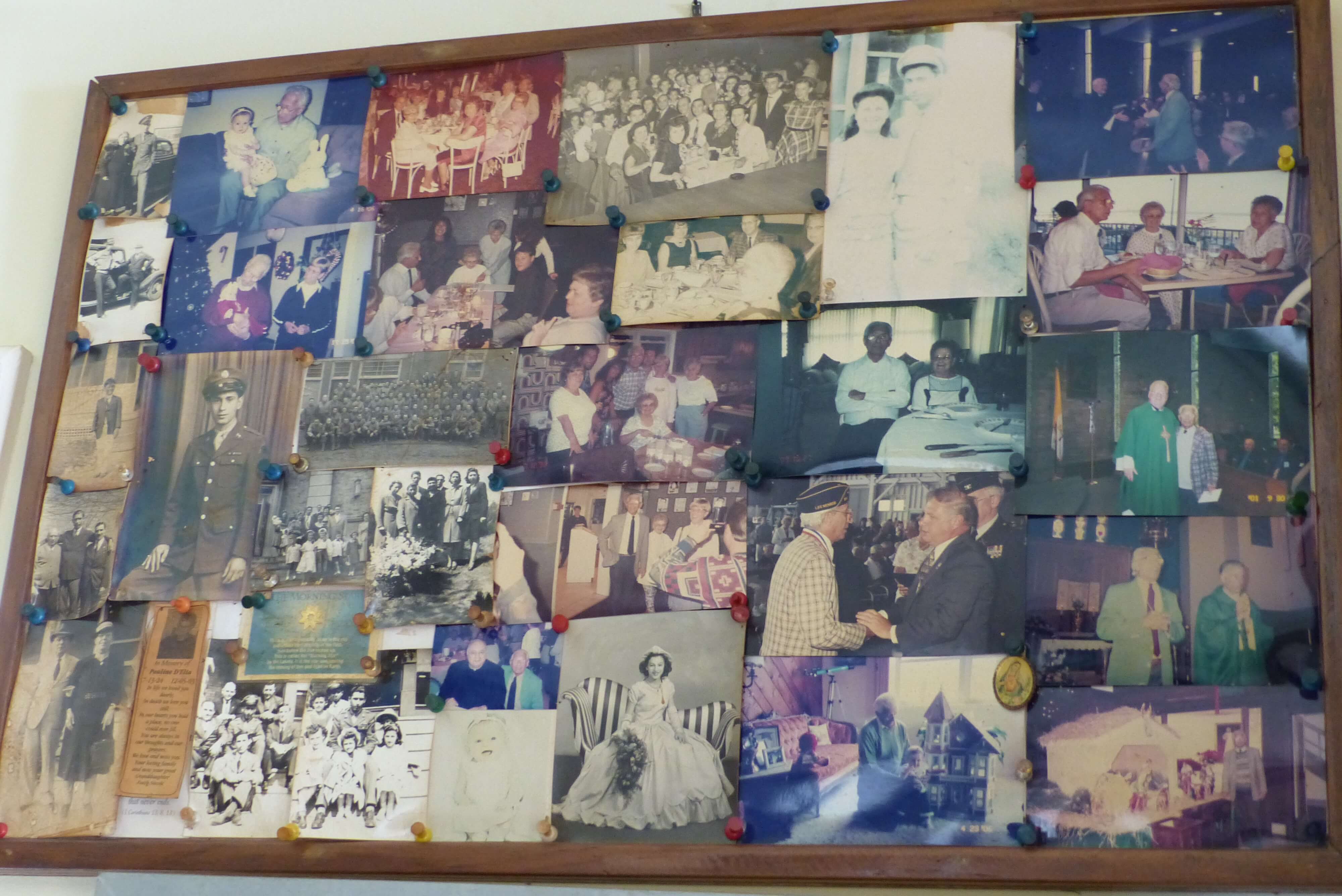 A photo collage in D’Elia’s garage features photos of family members and his wife