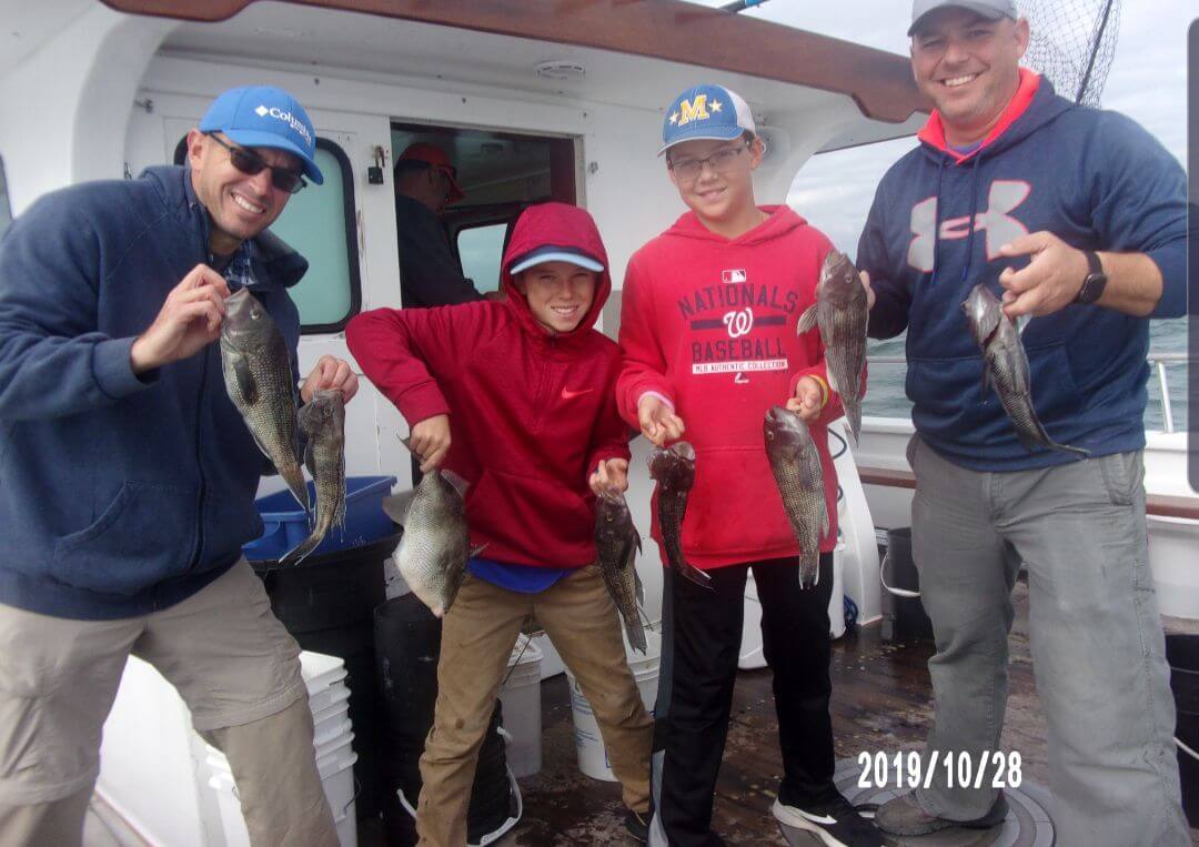 Four happy anglers.