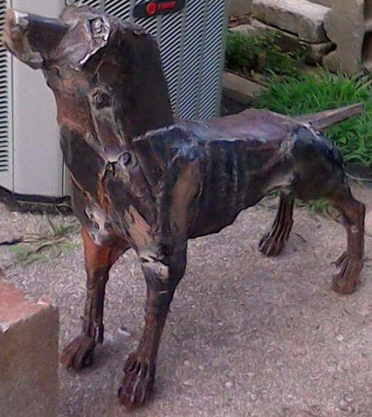 This Bratsberg sculpture of a dog sits at the entrance to the Bergin University of Canine Studies in Penngrove