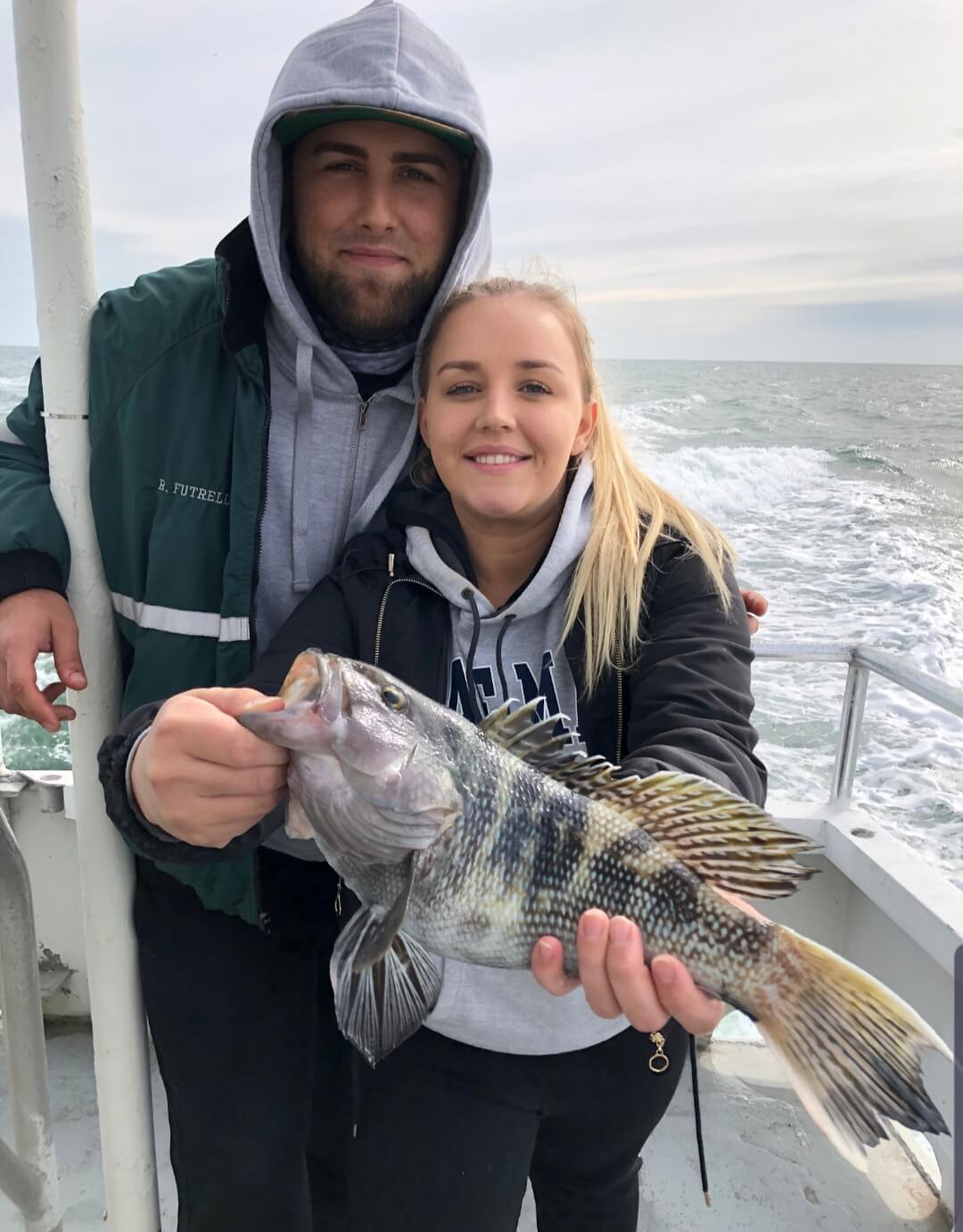 A nice sea bass for this couple. 