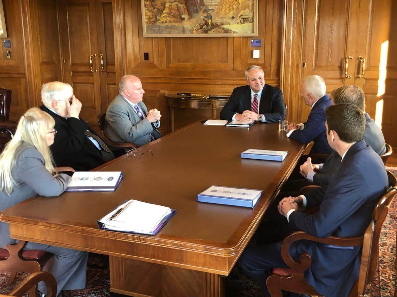 U.S. Department of Interior Secretary David Bernhardt hosts a meeting in his office to discuss the CBRA issue.  From left