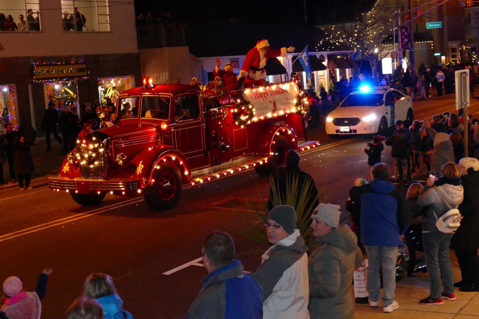 Vintage fire engine conveys Santa and Mrs. Claus to Stone Harbor Nov. 30 during the Christmas parade. 