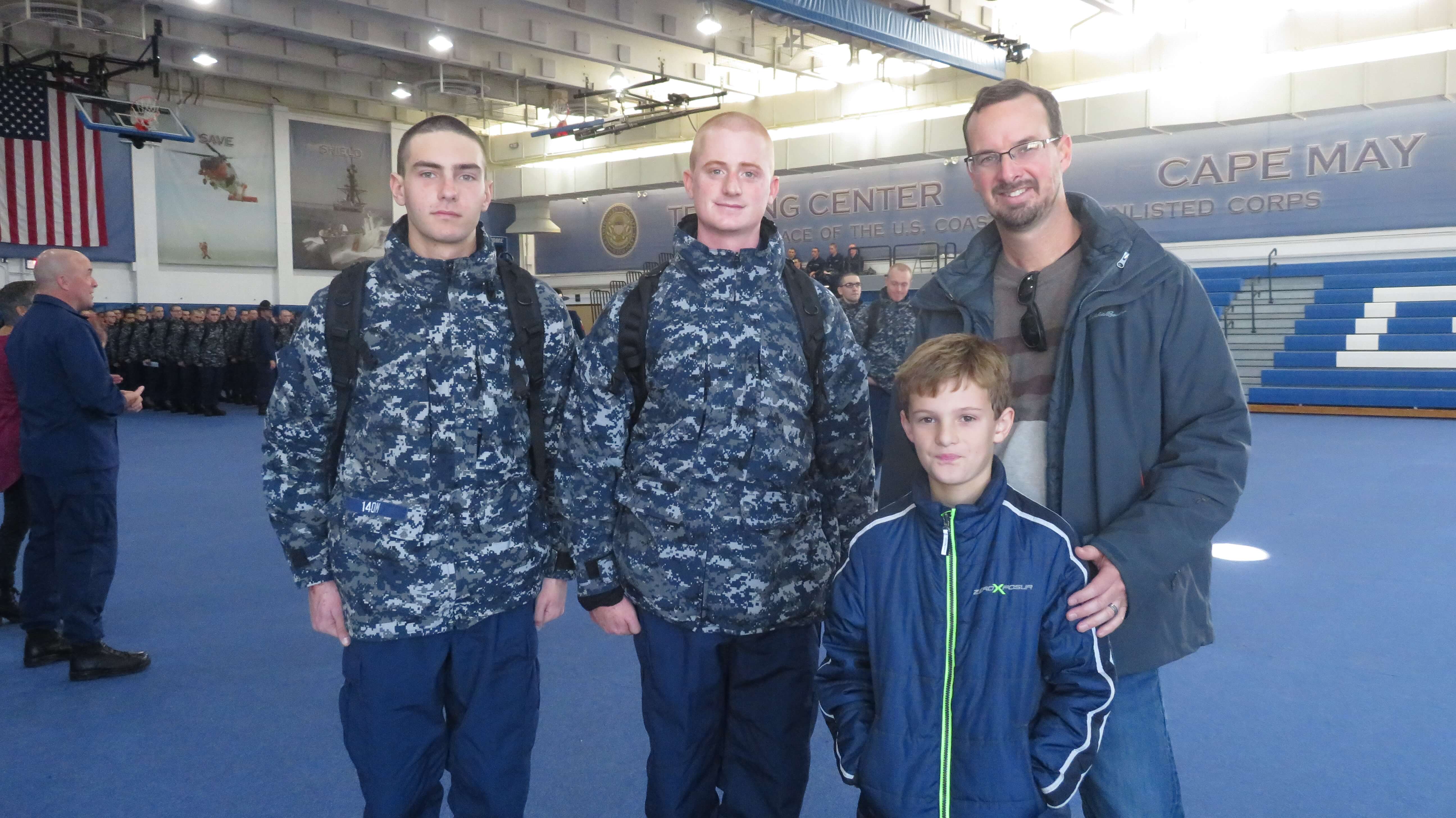 U.S. Coast Guard recruits Austin Gray and Joshua Sorvillo head out of the Training Center in Cape May with nine-year-old Nathan and his father Tom Stocker to their home in Cape May Court House to celebrate Thanksgiving Day as part of Operation Fireside. 