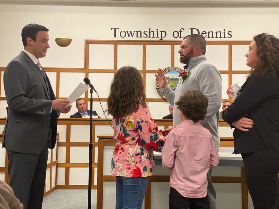 Matthew Cox takes the oath of office from Sen. Michael Testa (R-1st).