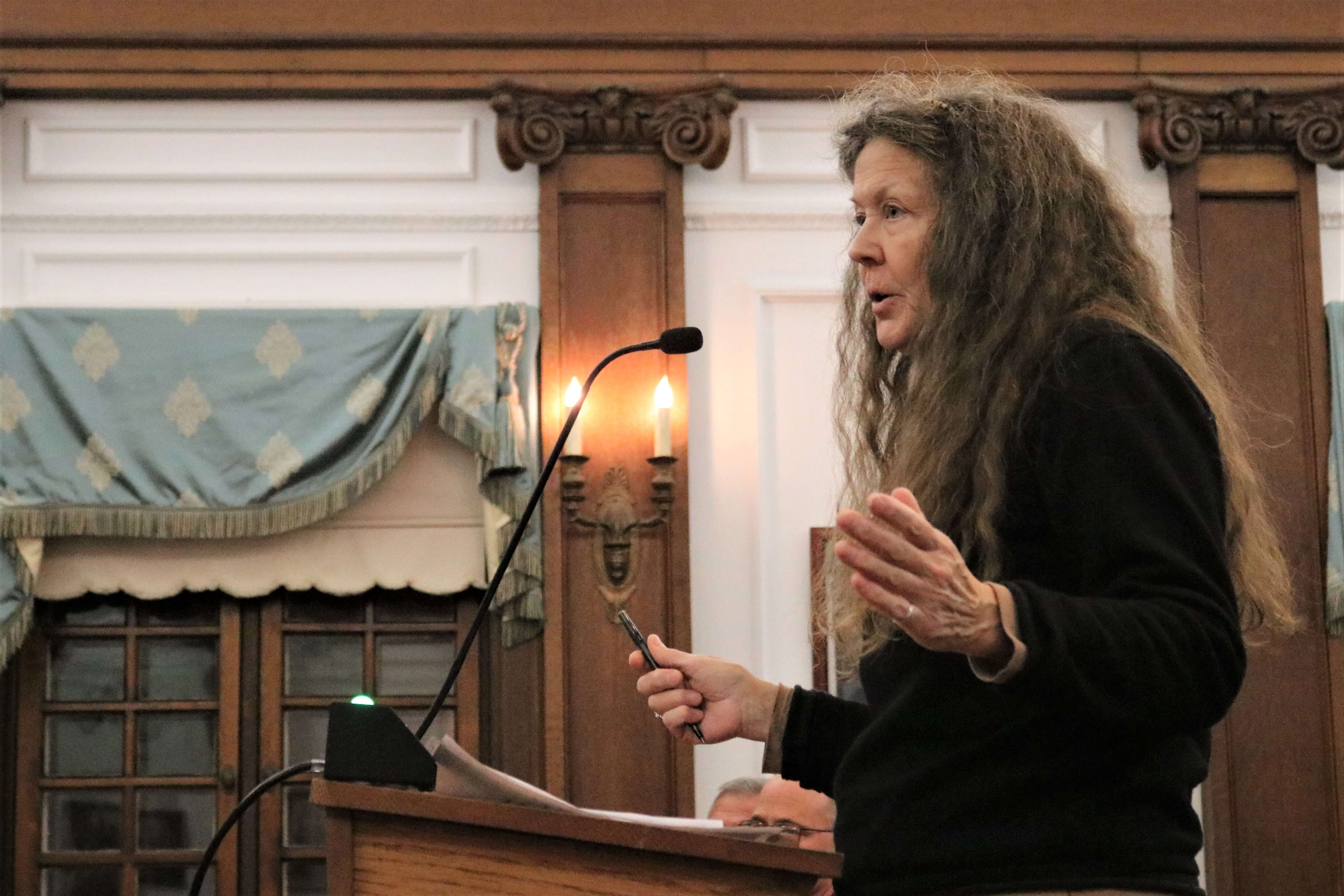 Resident Donna Moore questions city spending on the firm Jan. 23