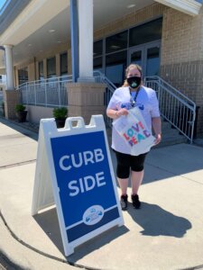 Ocean City Free Library staff have signs pointing to where patrons can pick up their orders after placing them via phone or online. If the books are on the shelves