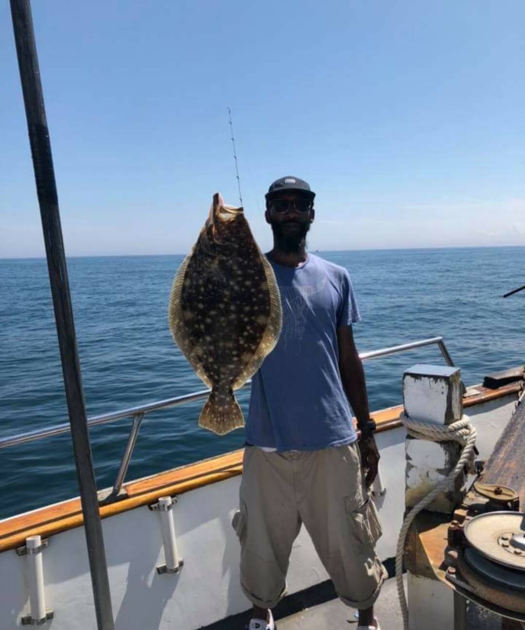 Everett Fleming and his pool-winning flounder.