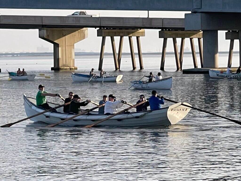 Rowers warm up in a six-person replica U.S. Lifesaving Service surfboat for the 13th Annual Pilgrim Paddle. The crew consists of: Don Otto; Forward- Chuck Dunn; Midship- Paul Sweeney