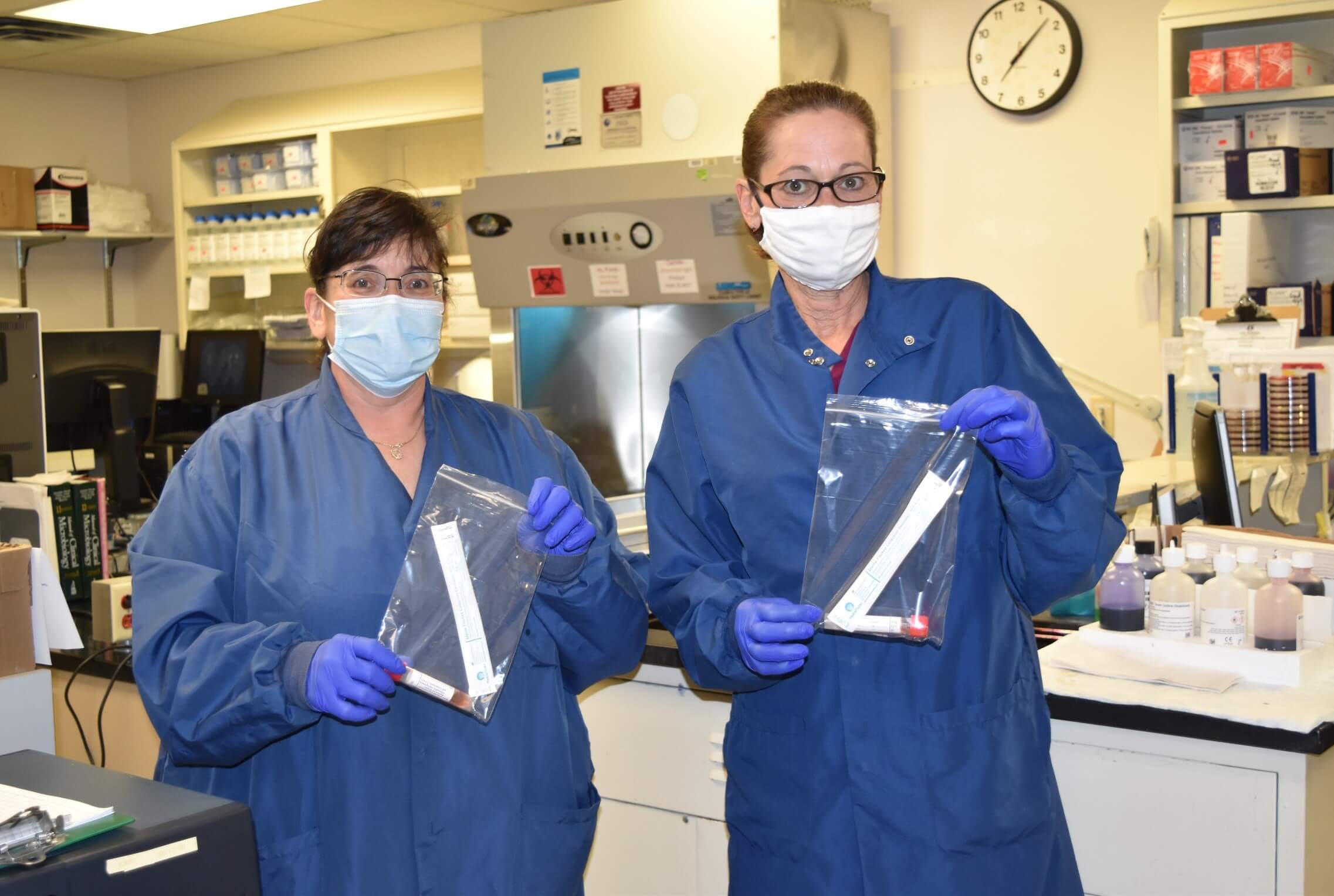 Two medical lab technologists at Cape Regional Medical Center collected samples for COVID-19 testing. Hospital staff wear protective equipment to limit their exposure to the virus.