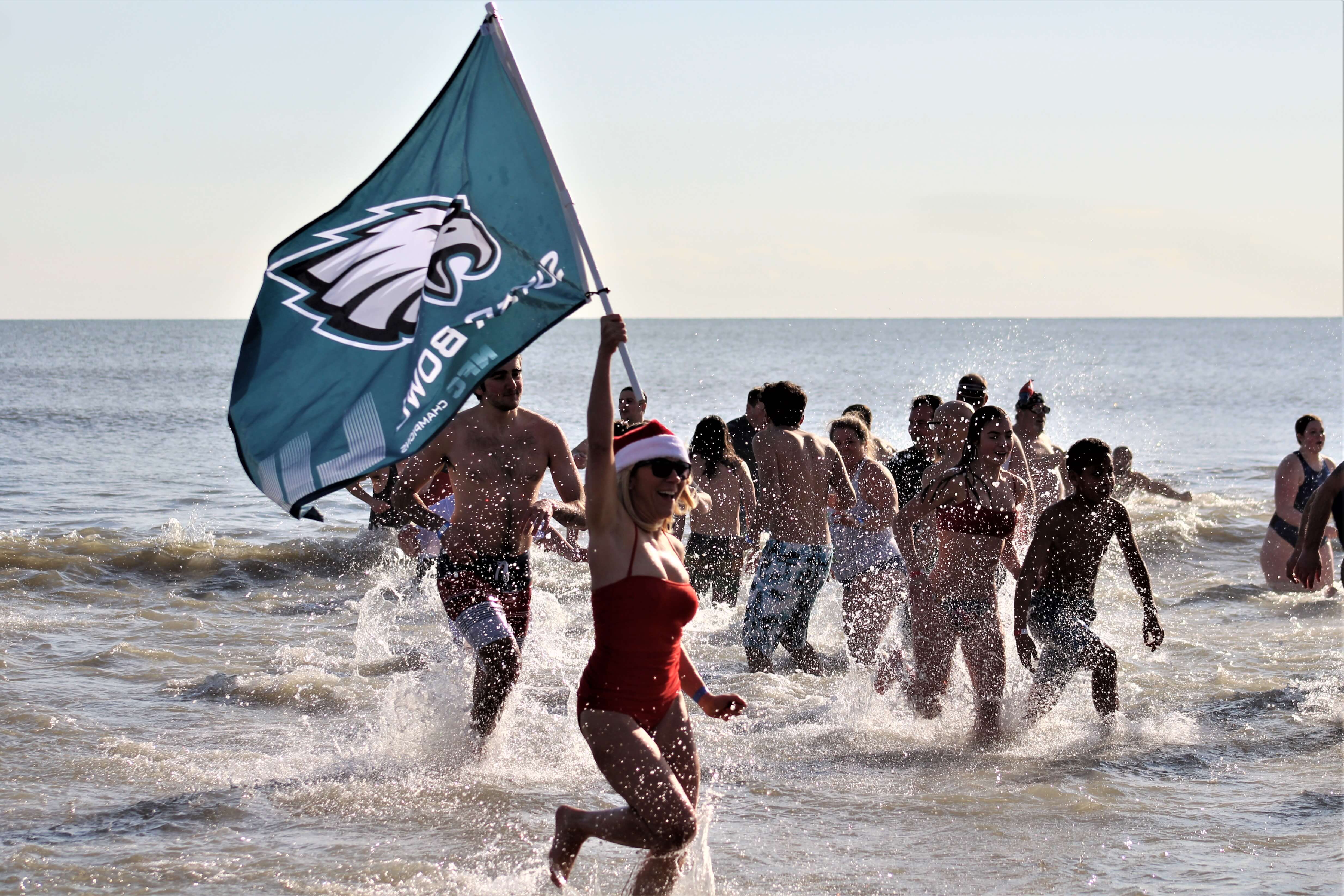 Hundreds braved cold ocean water to ring in the New Year