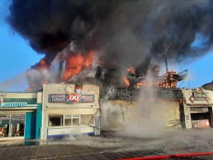 Flames shot out of a series of buildings on the Ocean City Boardwalk Jan. 30. The buildings damaged by the fire housed the Castaway Cove arcade