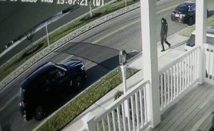 Surveillance footage released by the Stone Harbor Police Department shows a vehicle theft suspect shortly before police say they entered a the pictured SUV and left the scene. The police department is asking for the public's help to identify the suspect.