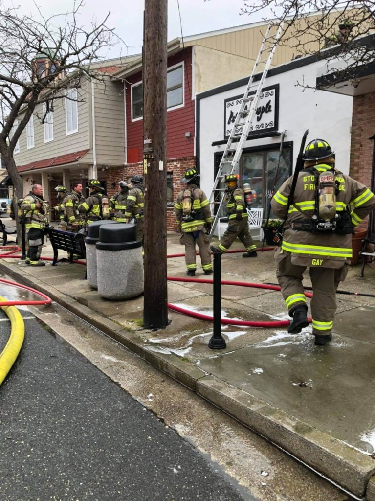 Several fire departments worked to extinguish a blaze found between the ceiling and roof of a commercial Stone Harbor building Feb. 3