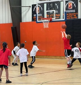 Players in Middle Township’s K-3 basketball program play in their Feb. 6 season opener at Martin Luther King Center.