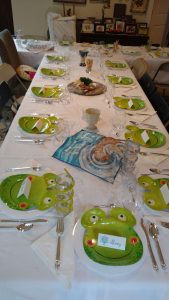 Rabbi Ron Isaacs and his family celebrate a recent Passover with a frog theme. Keeping children engaged is a priority for Isaacs. 