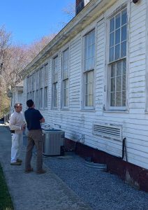 Middle Township Committeeman Ike Gandy (right) takes a look at the exterior of the historic Whitesboro Schoolhouse with Cape May Painting contractor Jerry Gallagher. The building’s exterior will be painted this spring.