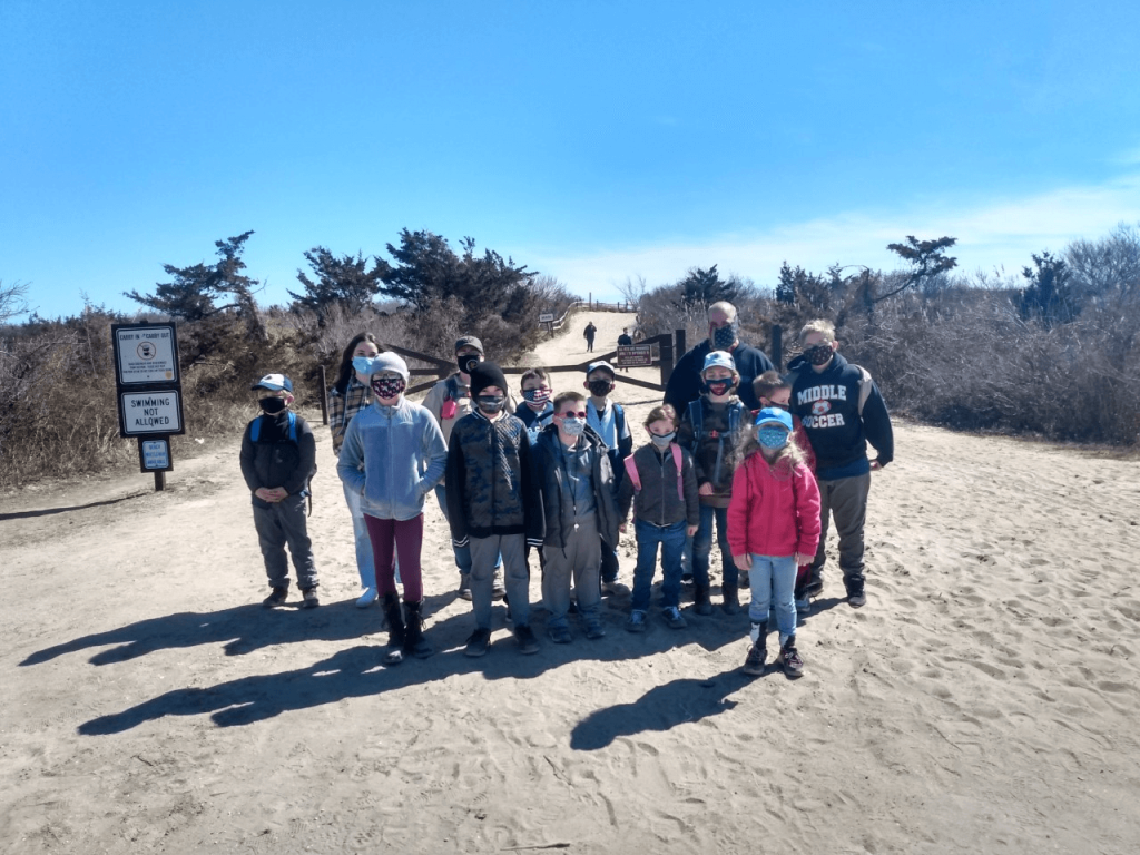 Members from Cub Scout Pack 65 embark on a hike through Cape May Point State Park March 13