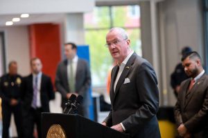 Gov. Phil Murphy signs an executive order to establish a statewide Climate Change Resiliency Strategy Oct. 28