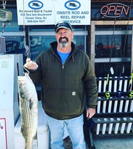 Mike and his 32-inch striped bass.