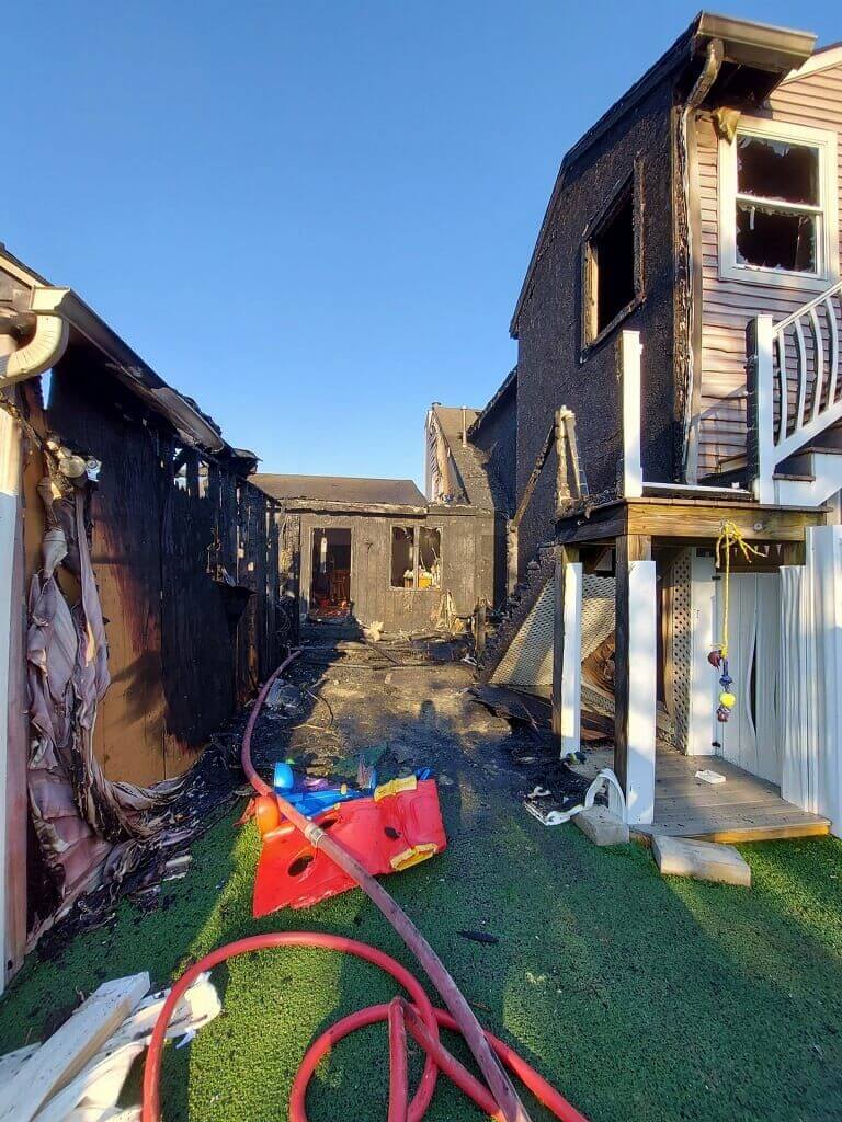 Firefighters June 6 extinguished a blaze that spread from a shed to a adjacent two-story home