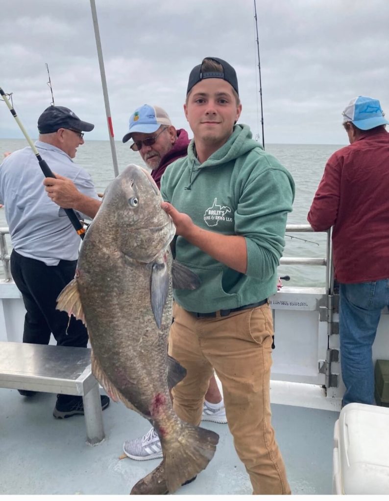 Jed Tighe and his 65-pound drumfish.