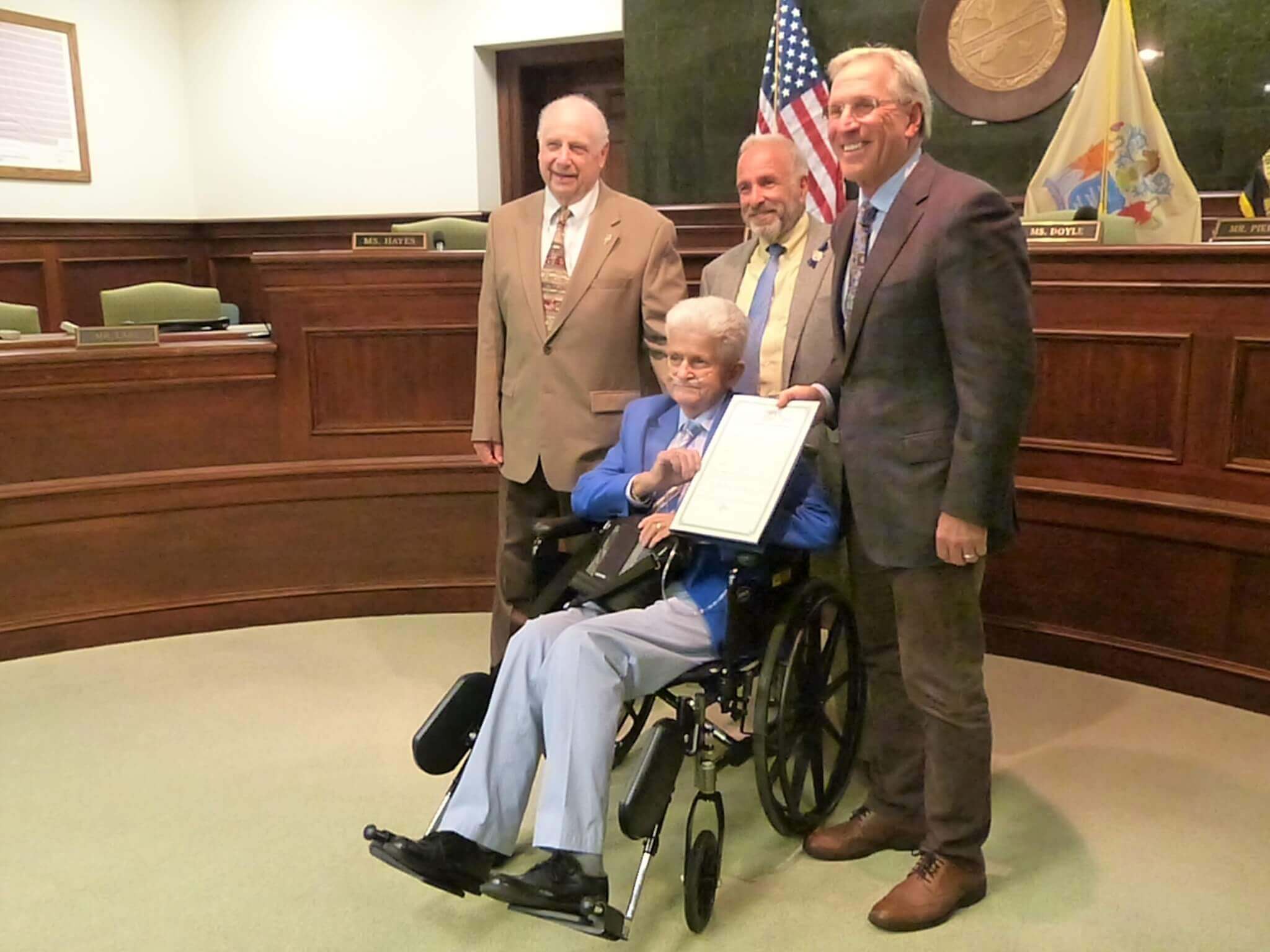 Robert Boyd accepts resolution for 16 years of service on the county’s Technical School and Special Services District School Board from County Commissioners June 22. From left is Director Gerald Thornton