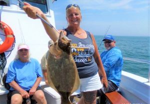 Kirsten Johansen and her 3.3-pound flounder.