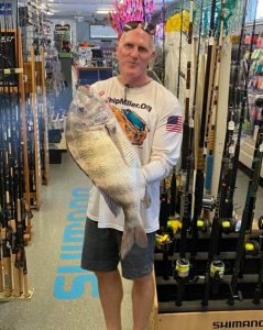 Lance Miller and his 14.22-pound sheepshead.