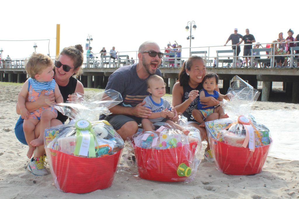 Winners of the 2021 Pamper Scamper crawling race included (left to right): Second-place Baker Lamb