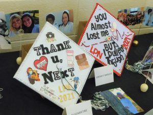 Graduation caps were displayed outside the Scrivani Gym for the practical nursing Class of 2021. 
