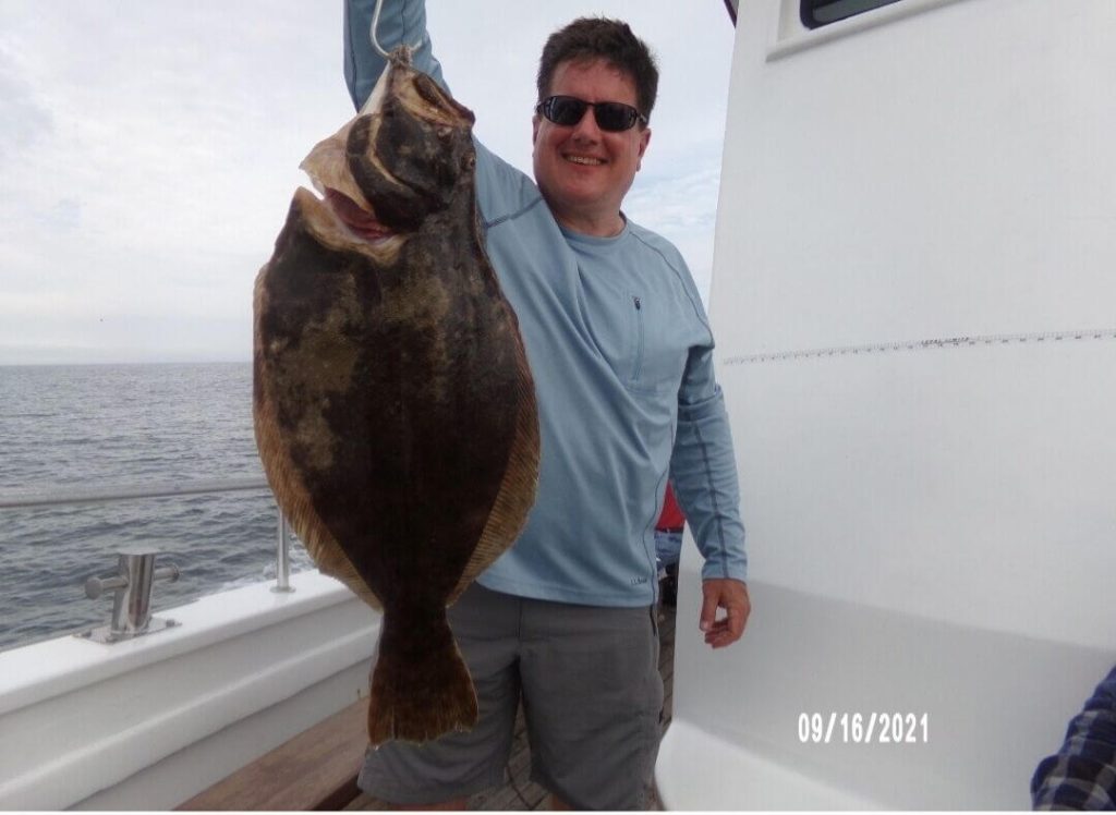 Doug Costa and his 5.8-pound flounder.