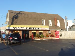 A local customer pulls up to Tonio's Pizzeria Oct. 15. The restaurant