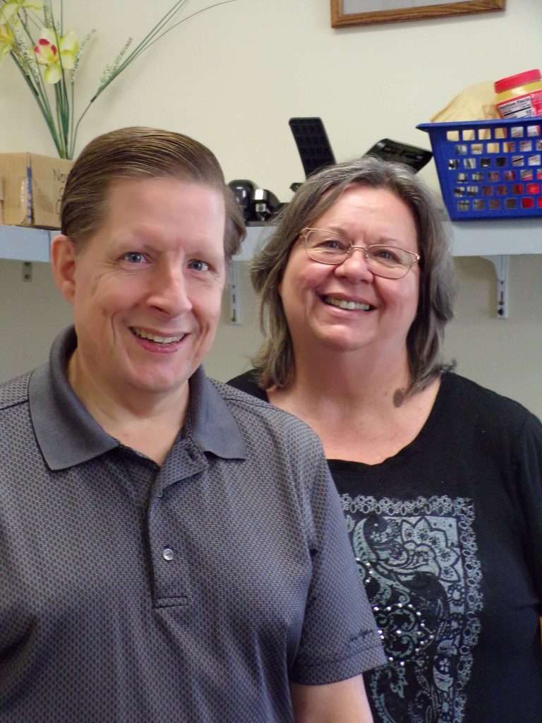 Pastor Glenn Scheyhing and Secretary/Treasurer Marjorie Katity labor to keep Tabernacle United Methodist Church financially stable. 