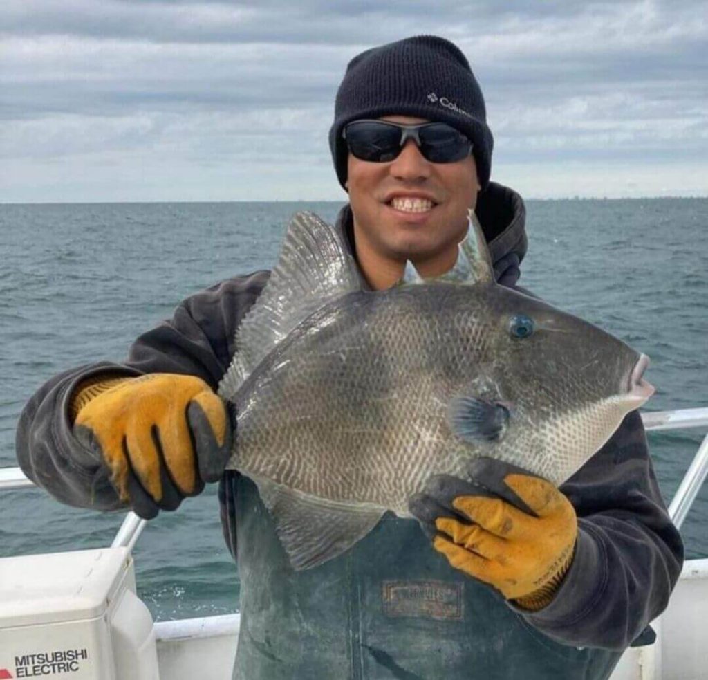 Christian and his personal best triggerfish.