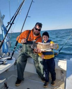 Brad and Liam with their nice blackfish.  