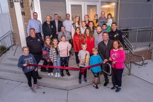 Members of the Ocean City Regional Chamber of Commerce cut a red ribbon Oct. 27 to officially welcome community members and visitors to the city’s newly renovated Sports and Civic Center