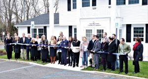 Chamber members and officials stand outside of the newly renovated Cape May County Chamber of Commerce Headquarters. 