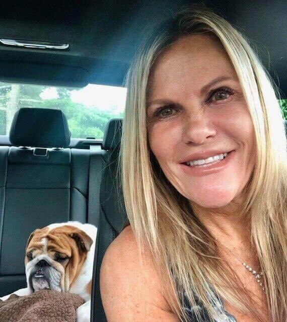 Theresa Senico pictured with one of her pet bulldogs.