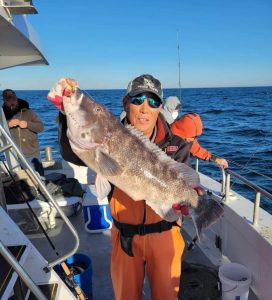 Mike Jung and his personal best 13.25-pound blackfish