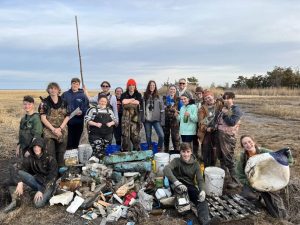 Cape May Tech Students waded into the marsh for a cleanup project and to learn more about the wetland's ecology.
