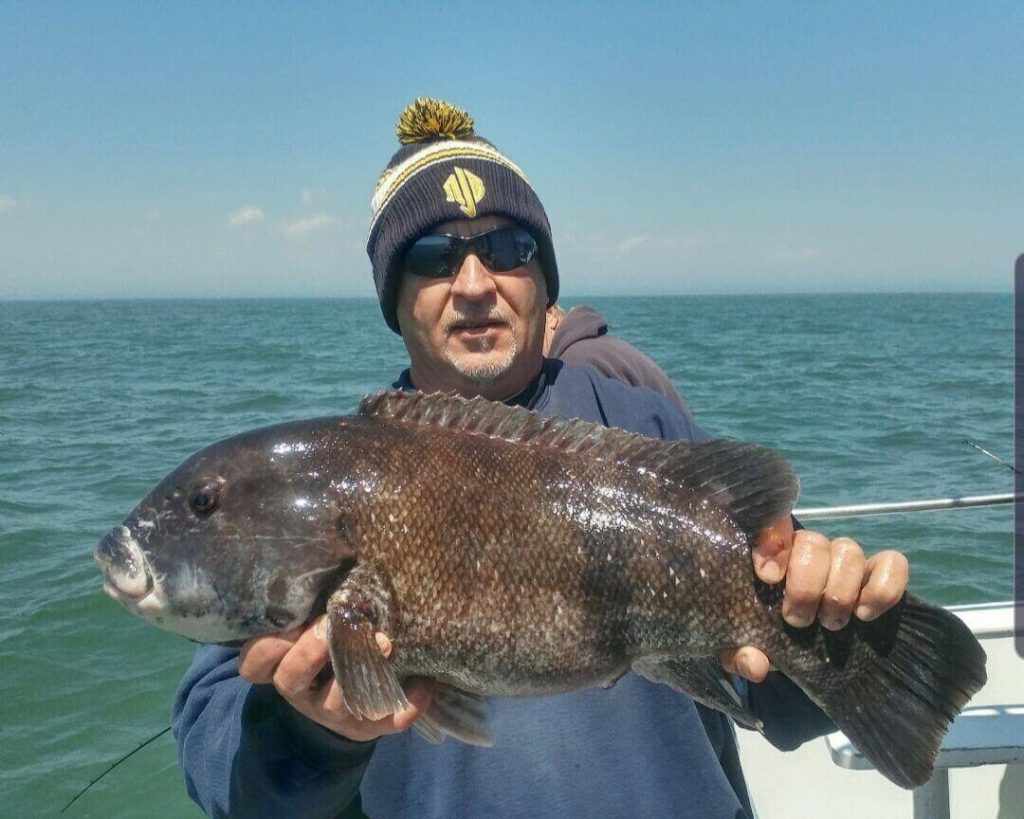 Mark Robbins with a 9.75-pound blackfish