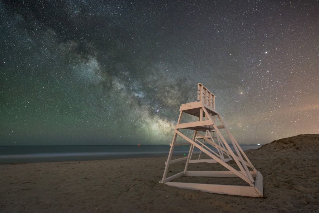 Lifeguard stands on the beach in Avalon under the stars. 